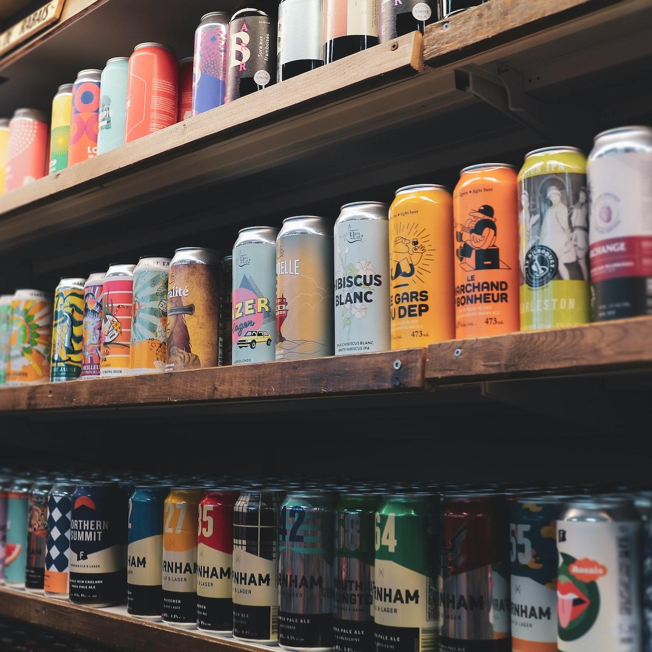 assorted plastic bottles on brown wooden shelf